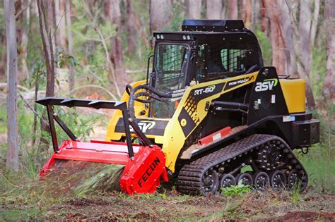 clearing brush with a skid steer|skid steer with forestry mulcher.